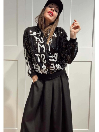 Bomber Lentejuelas Lettering THE BEST DRESSED Negro HEVE